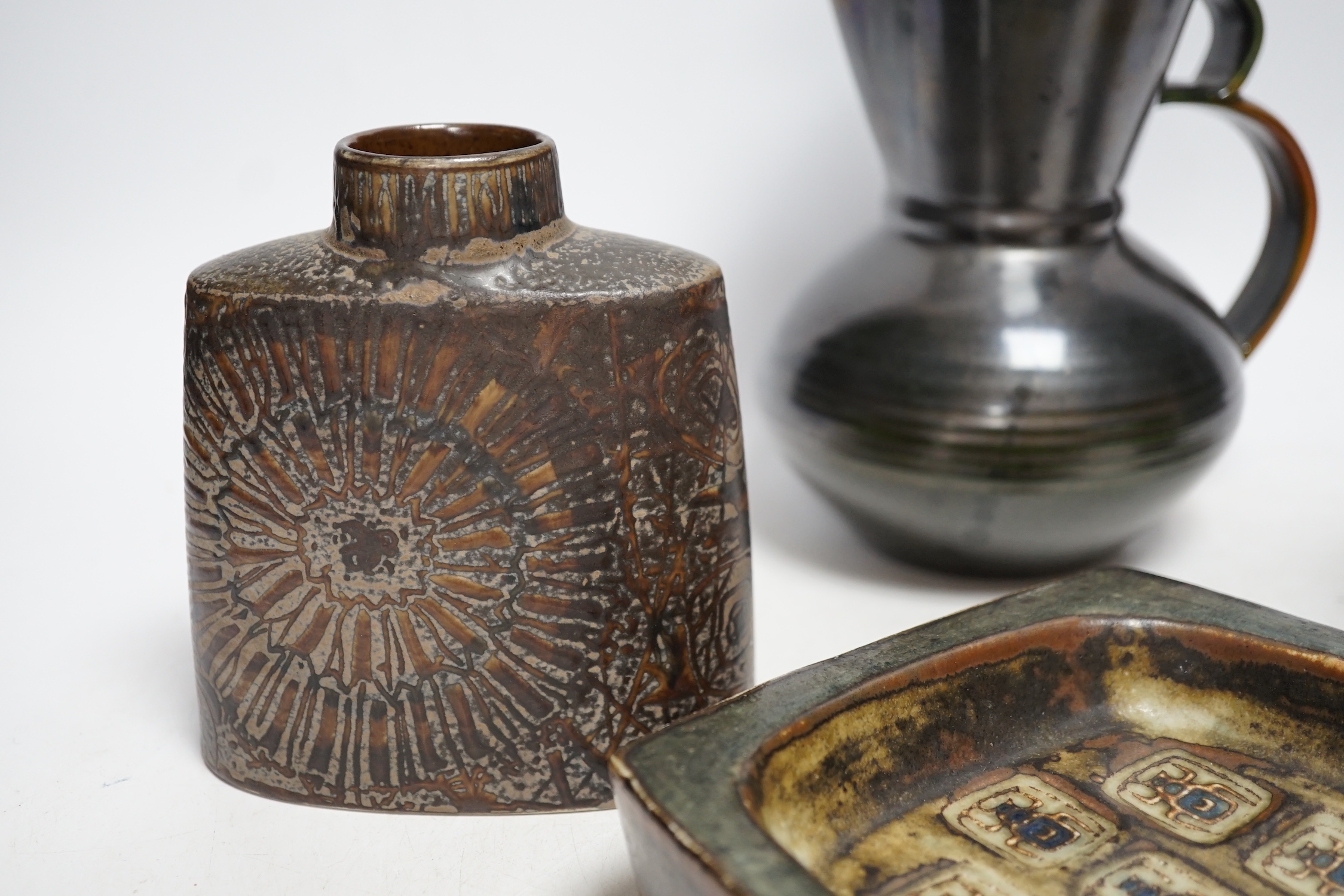Danish ceramics, including a Royal Copenhagen rectangular shallow dish, a Royal Copenhagen vase, a pedestal vase, and a Dissing, Denmark jug, tallest 19cm